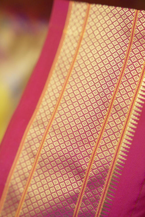 Vibrant Yellow and Magenta Pure Silk Paithani Saree with Zari Work